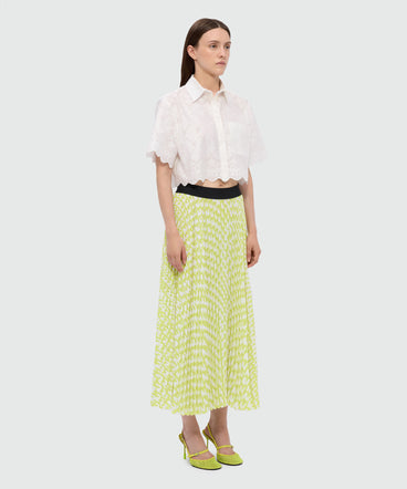 Lime pleated soleil skirt with all-over MWAVE logo print