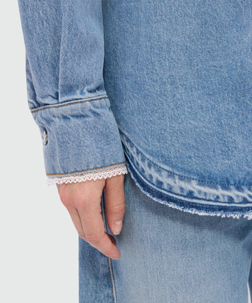 Stone-washed denim shirt with lace detail on the cuffs