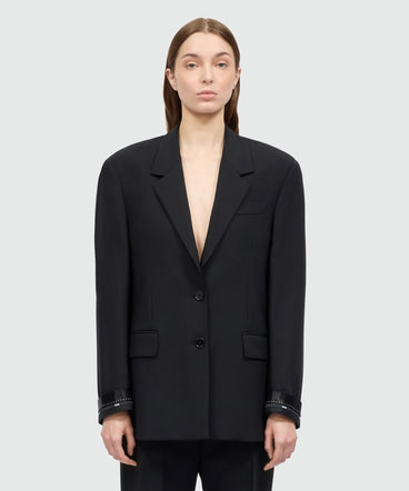 Black single-breasted lightweight wool jacket with two-button fastening and logo cuffs