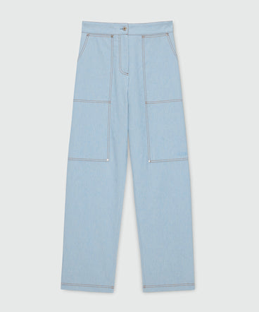 Oversized raw denim trousers with contrast stitching and metal rivets