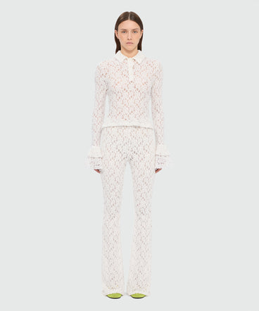 White flared stretch lace leggings with floral motif