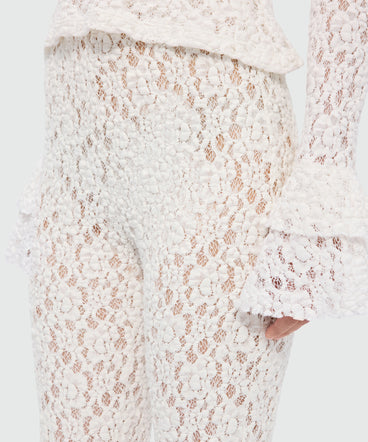 White flared stretch lace leggings with floral motif