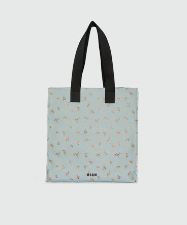 Light blue canvas tote with print and contrasting handles