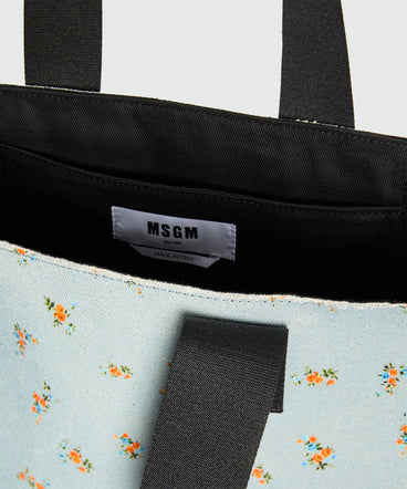 Light blue canvas tote with print and contrasting handles