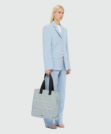 Light blue canvas tote with print and contrasting handles
