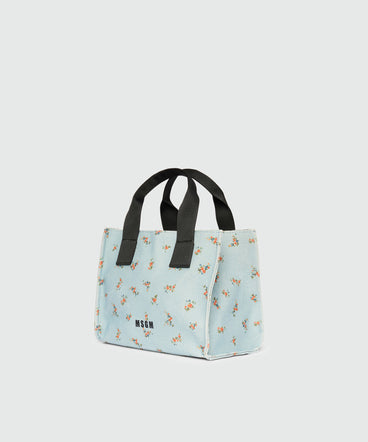 Light blue canvas micro tote with print and contrasting handles