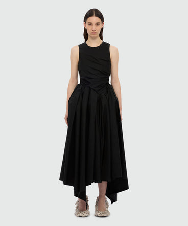 Black midi poplin dress with asymmetrical details.