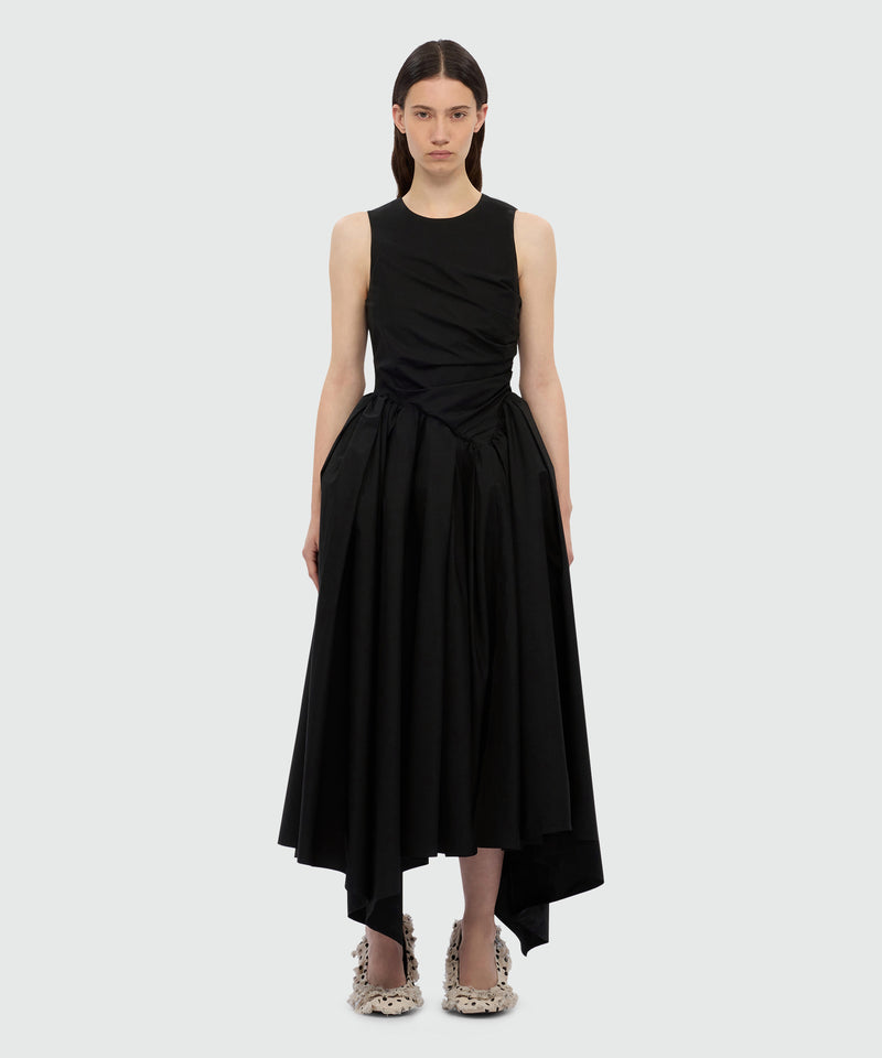 Black midi poplin dress with asymmetrical details. Black midi poplin dress with asymmetrical details.