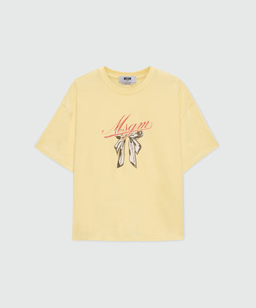 Yellow T-shirt with MSGM graphic print and bow.