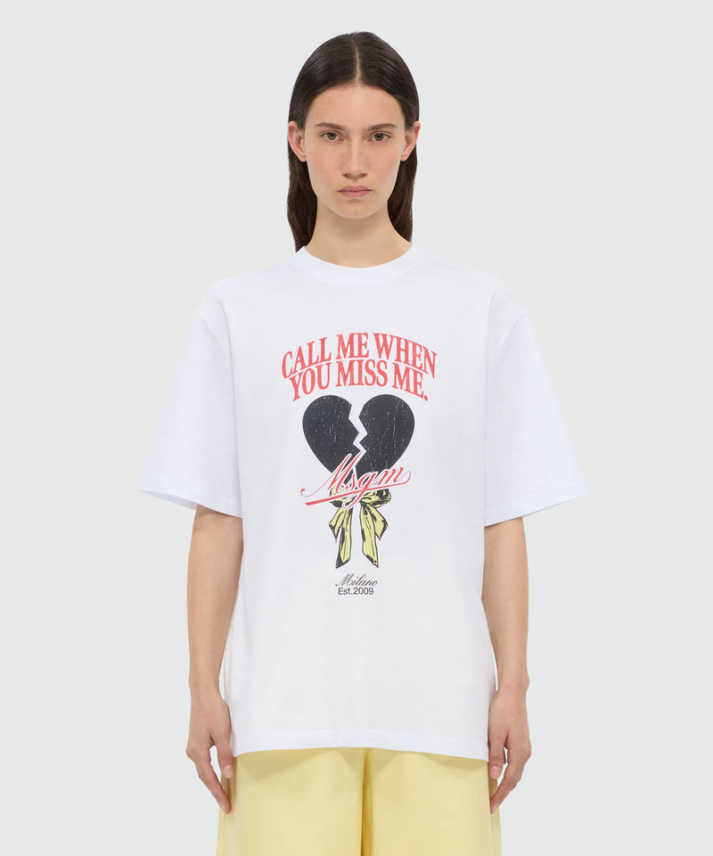 White T-shirt with MSGM "Call me when you miss me" graphic print. 01 Donna 