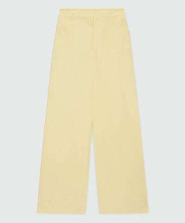 Yellow wide-leg cotton poplin trousers.