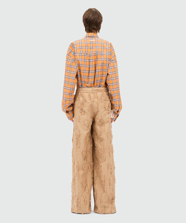 Beige wide-leg frayed fil coupe trousers.