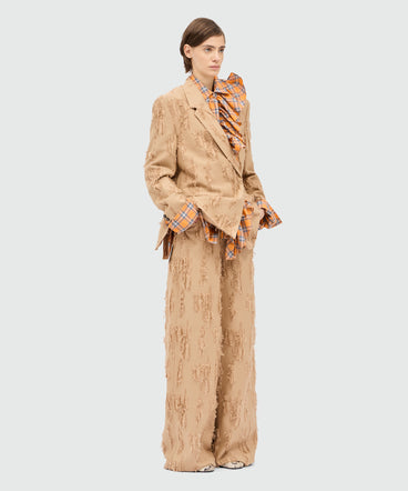 Beige wide-leg frayed fil coupe trousers.