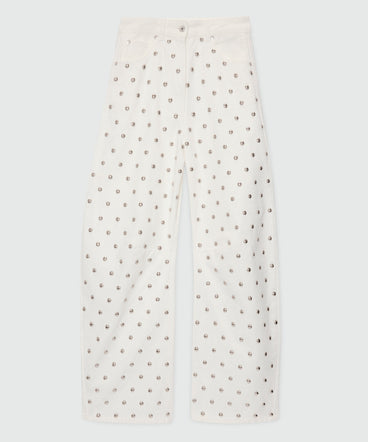 White barrel-fit trousers with studs.