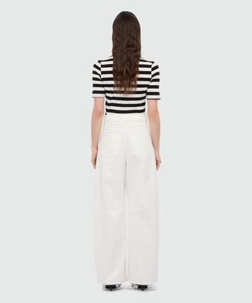 White barrel-fit trousers with studs.