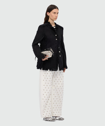 White barrel-fit trousers with studs.