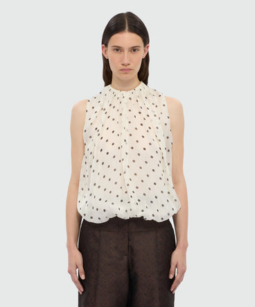 Polka dot chiffon balloon top.