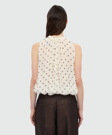 Polka dot chiffon balloon top.