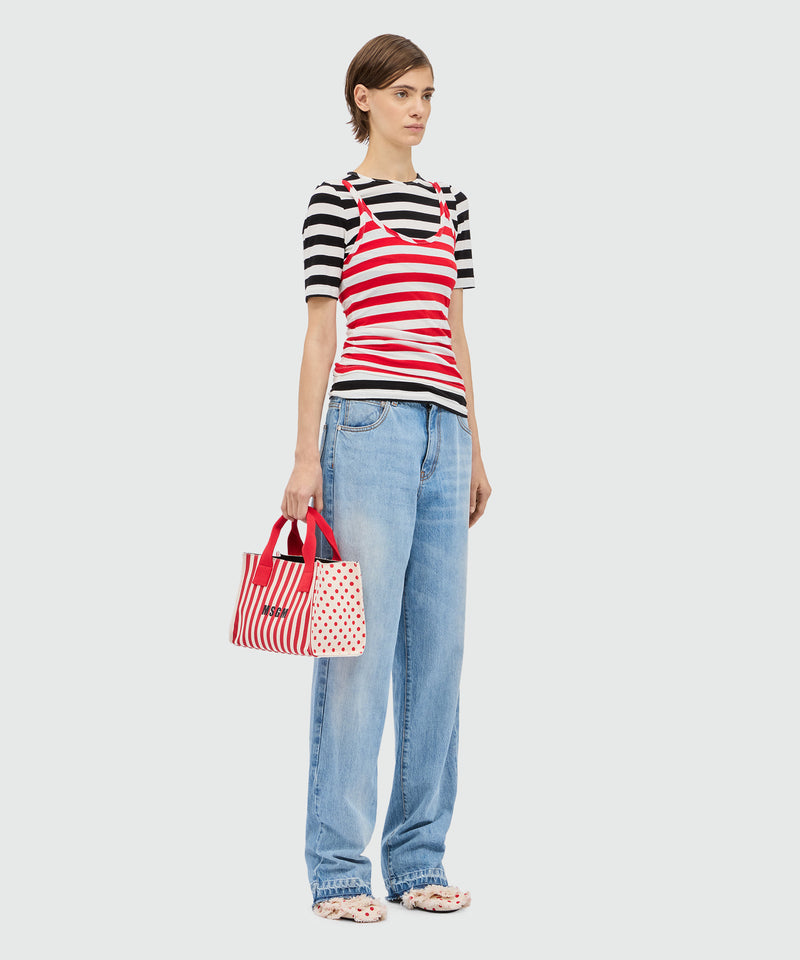 White and red striped jersey top. 18 Donna 