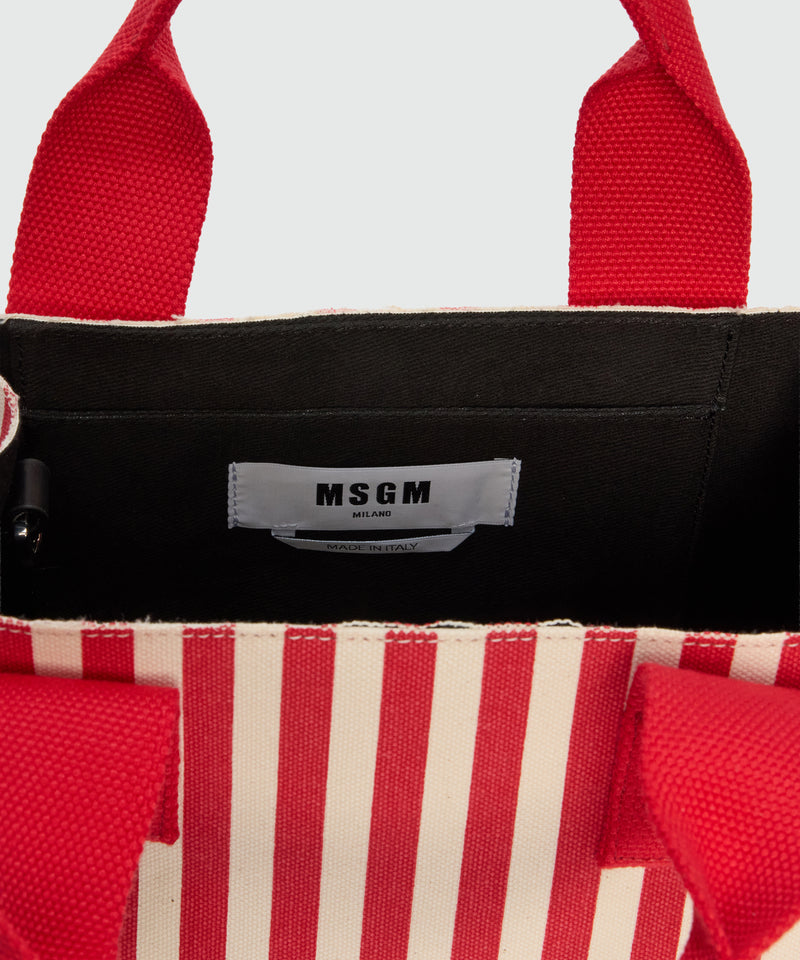 Small canvas tote with polka dot and stripe print. 18 Donna 