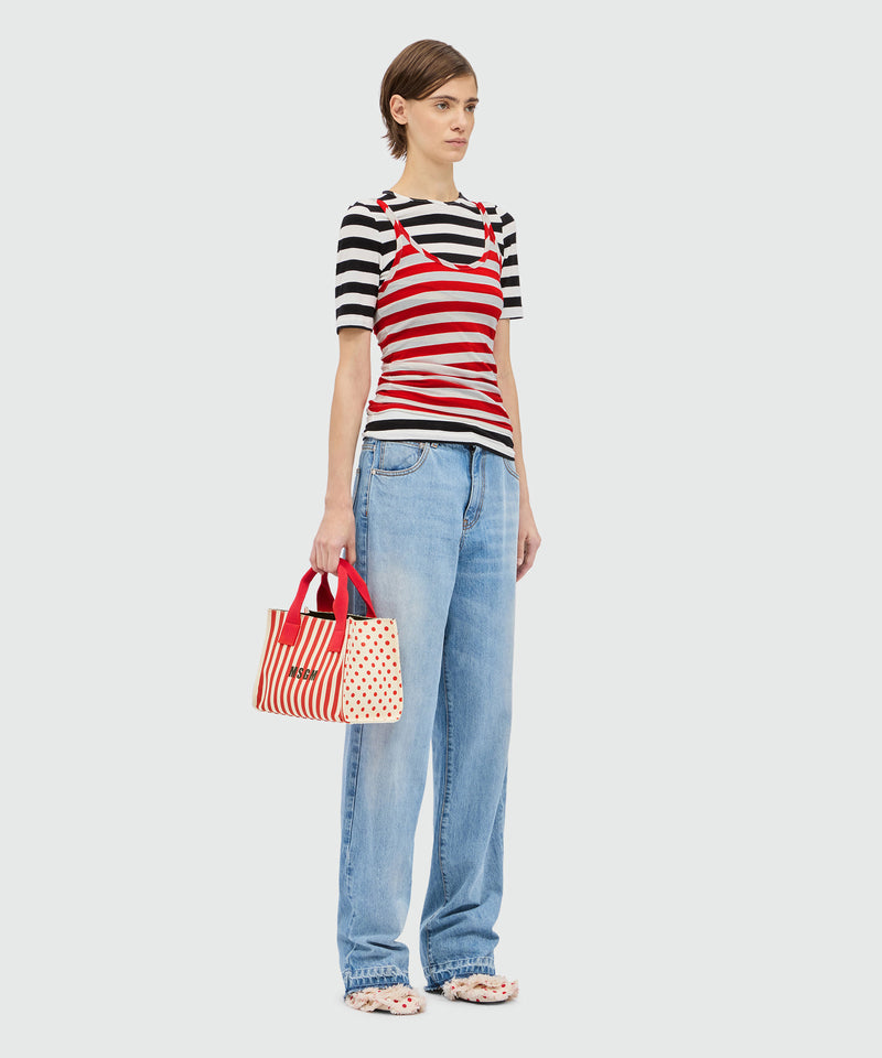 Small canvas tote with polka dot and stripe print. 18 Donna 