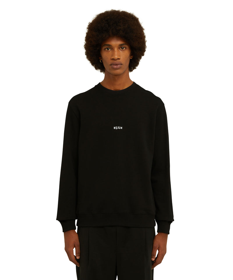 Felpa girocollo in cotone tinta unita con micro logo MSGM NERO Uomo 