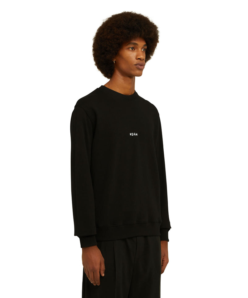 Felpa girocollo in cotone tinta unita con micro logo MSGM NERO Uomo 