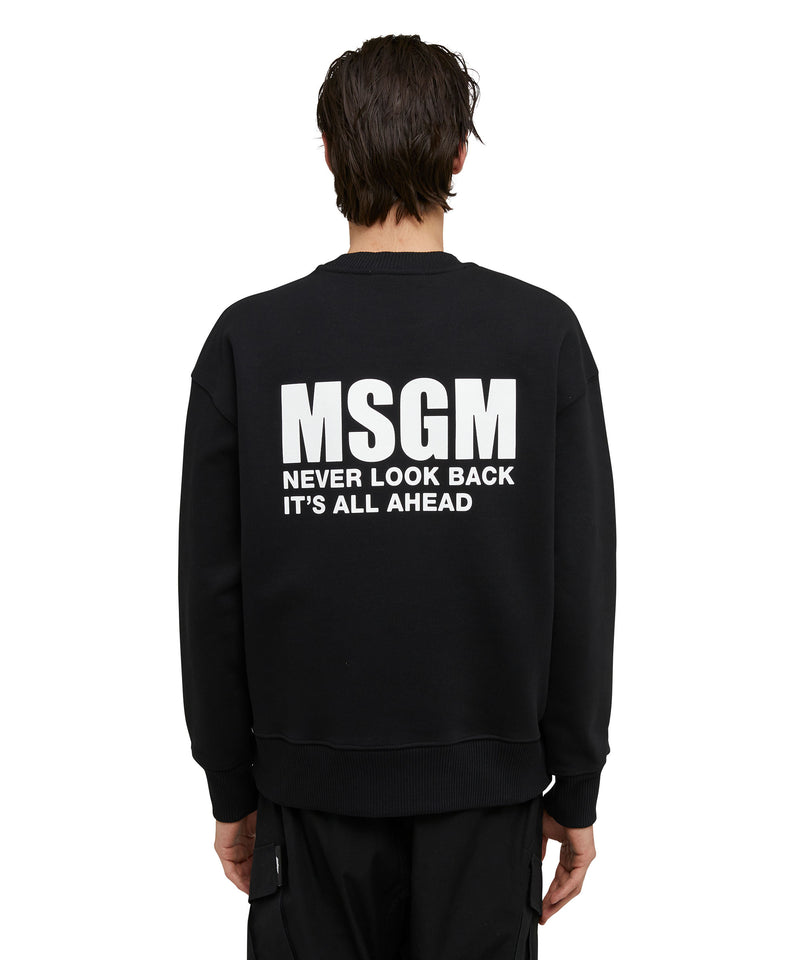 Solid color cotton crewneck sweatshirt with MSGM logo and quote BLACK Men 