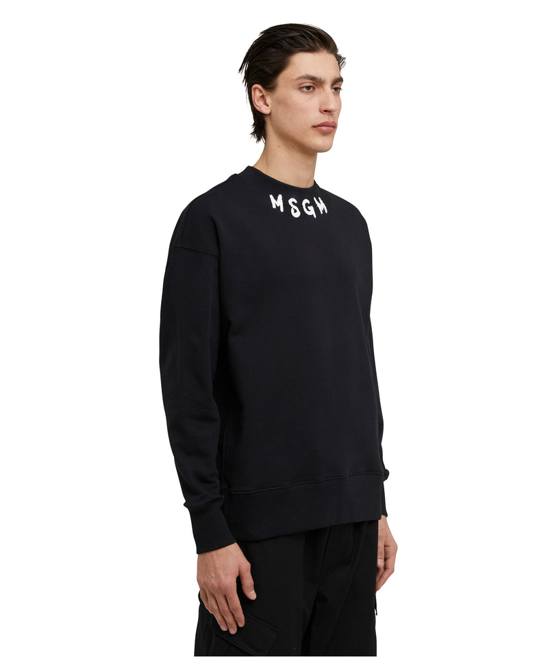 Felpa girocollo in cotone con logo pennellato MSGM posizionato sul collo NERO Uomo 